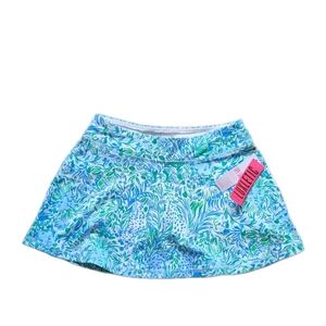NWT LILLY PULITZER Luxletic Aila Skort Hydra Blue Dandy Lions Medium UPF 50